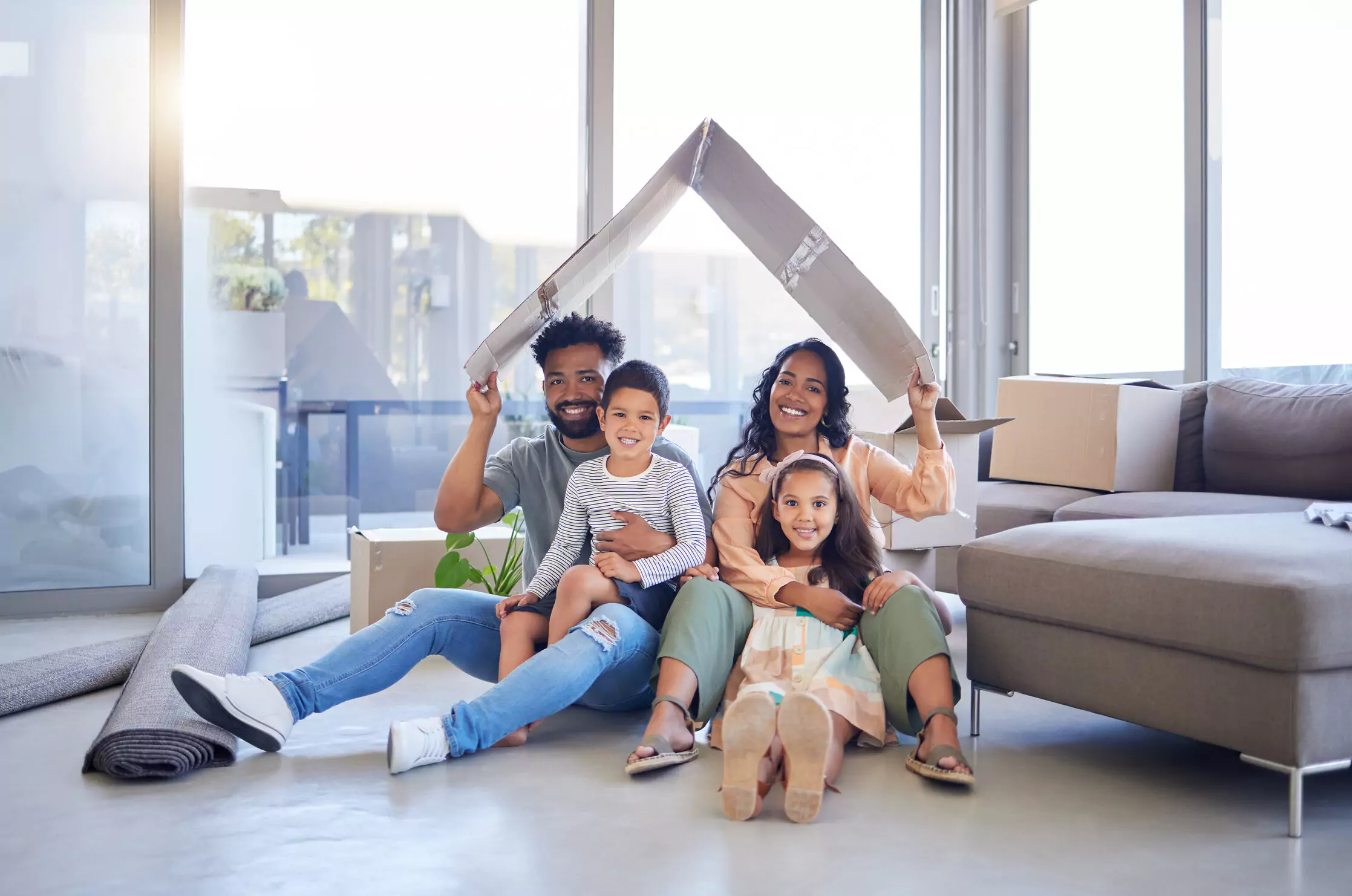 Happy family celebrating their new home